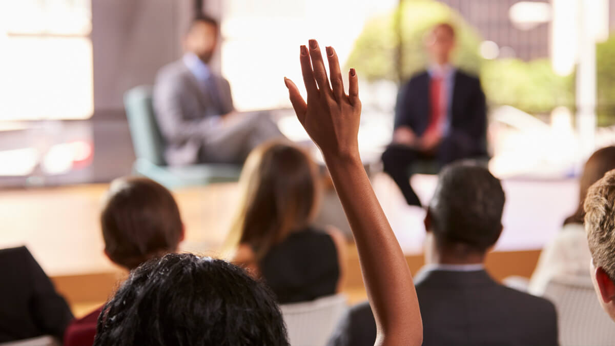 Woman raising her hand